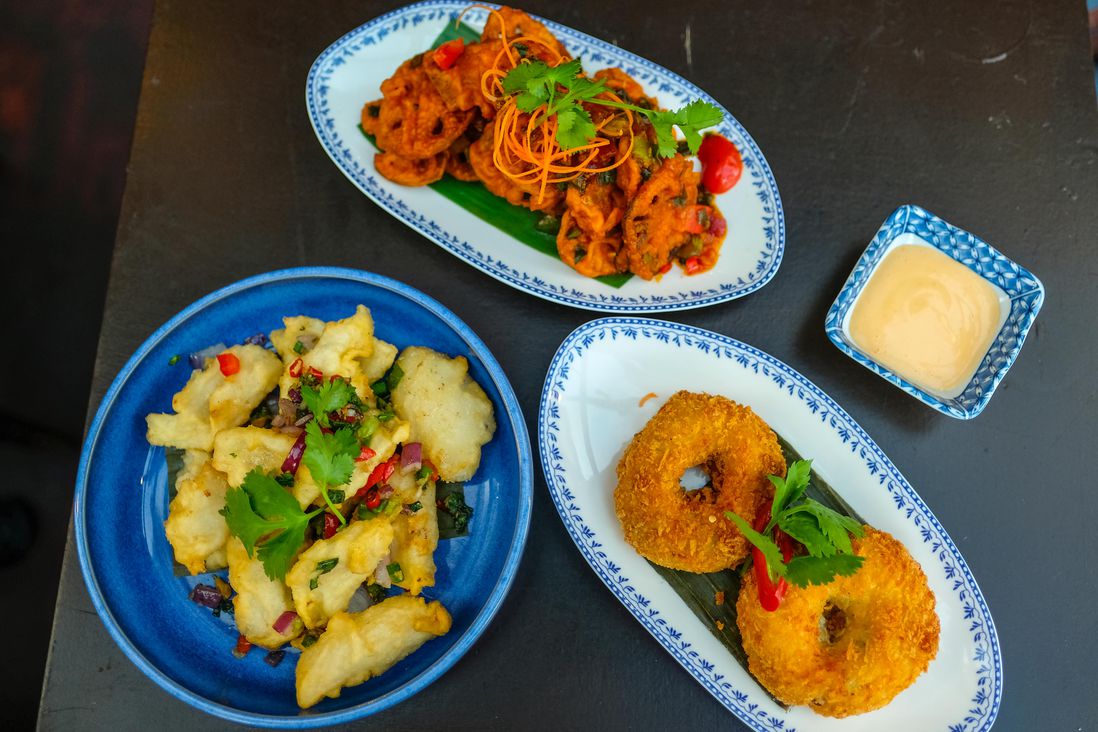 Crispy Lotus Root ($14), Savory Donuts ($12), Salt and Pepper Young Coconut ($15)